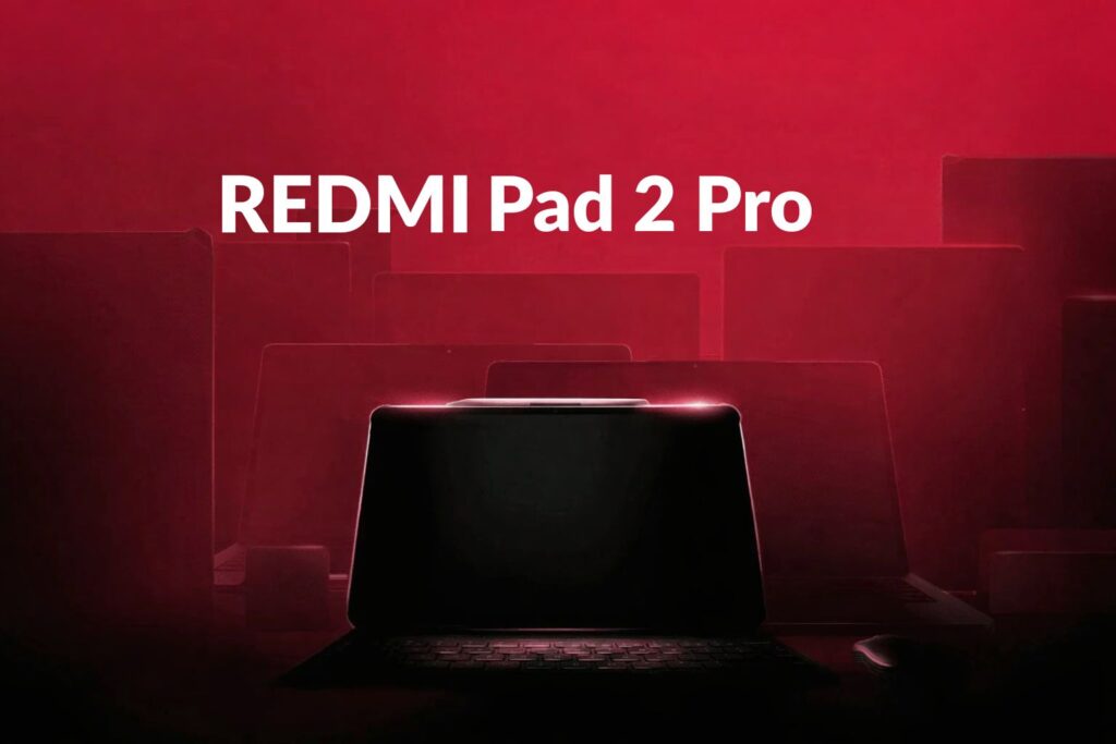 Red-lit promotional image of a tablet with a keyboard accessory, shown without on-screen text, highlighting a large display and productivity-focused design.