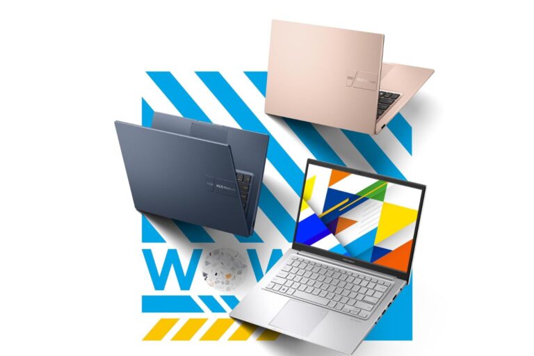 Three ASUS laptops on colorful background