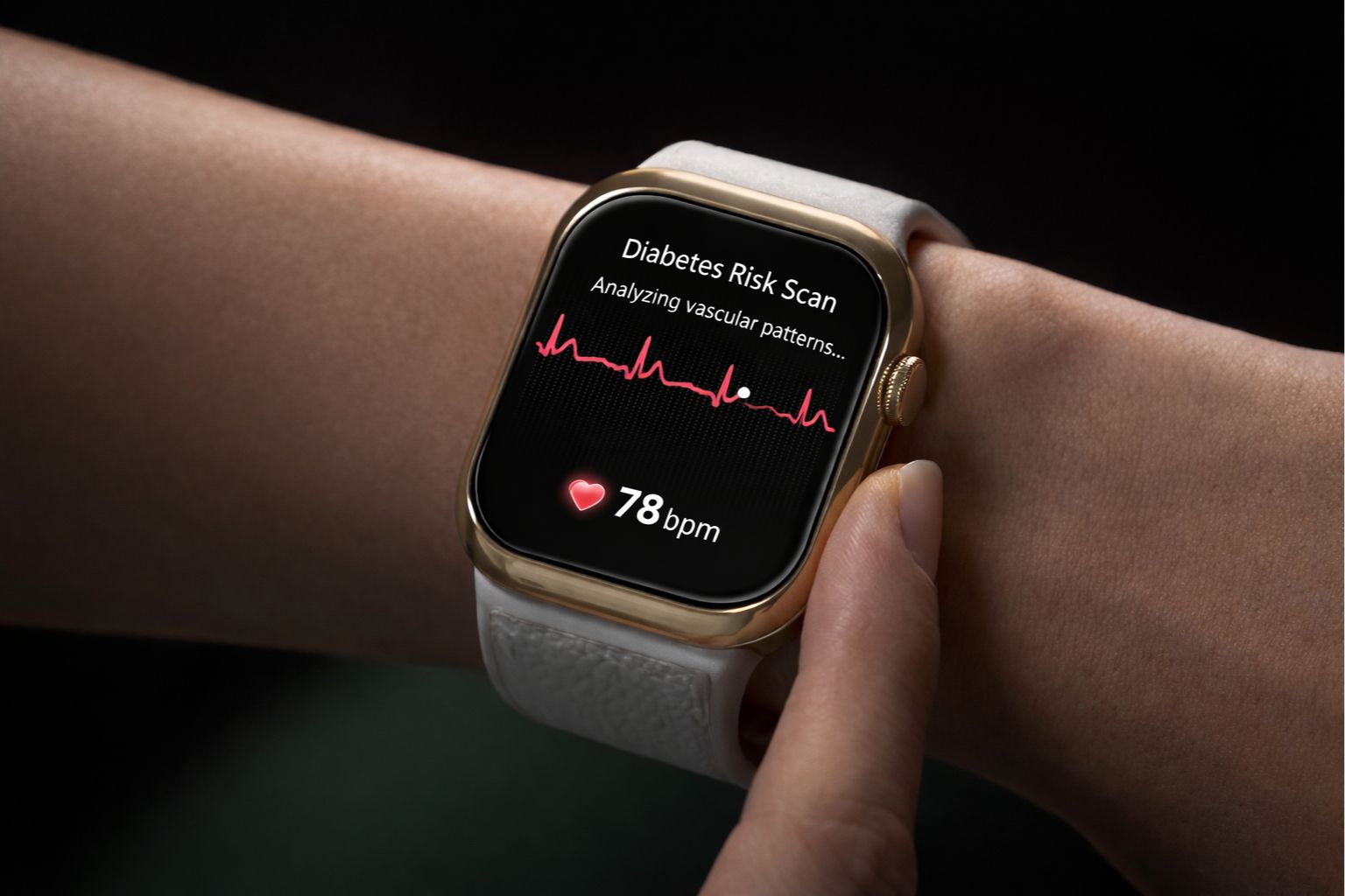 Close-up of a gold smartwatch on a wrist displaying a “Diabetes Risk Scan” screen with an ECG waveform, the message “Analyzing vascular patterns…” and a heart rate reading of 78 bpm.