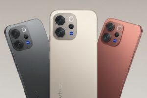 Three Vivo V70 series smartphones in grey, champagne gold, and bronze, showcasing the ZEISS branded camera modules under the headline Vivo V70 Series Launch
