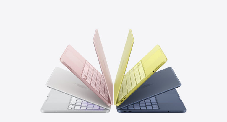 MacBook Neo in multiple colors shown in fan layout including silver pink yellow and blue variants on light background